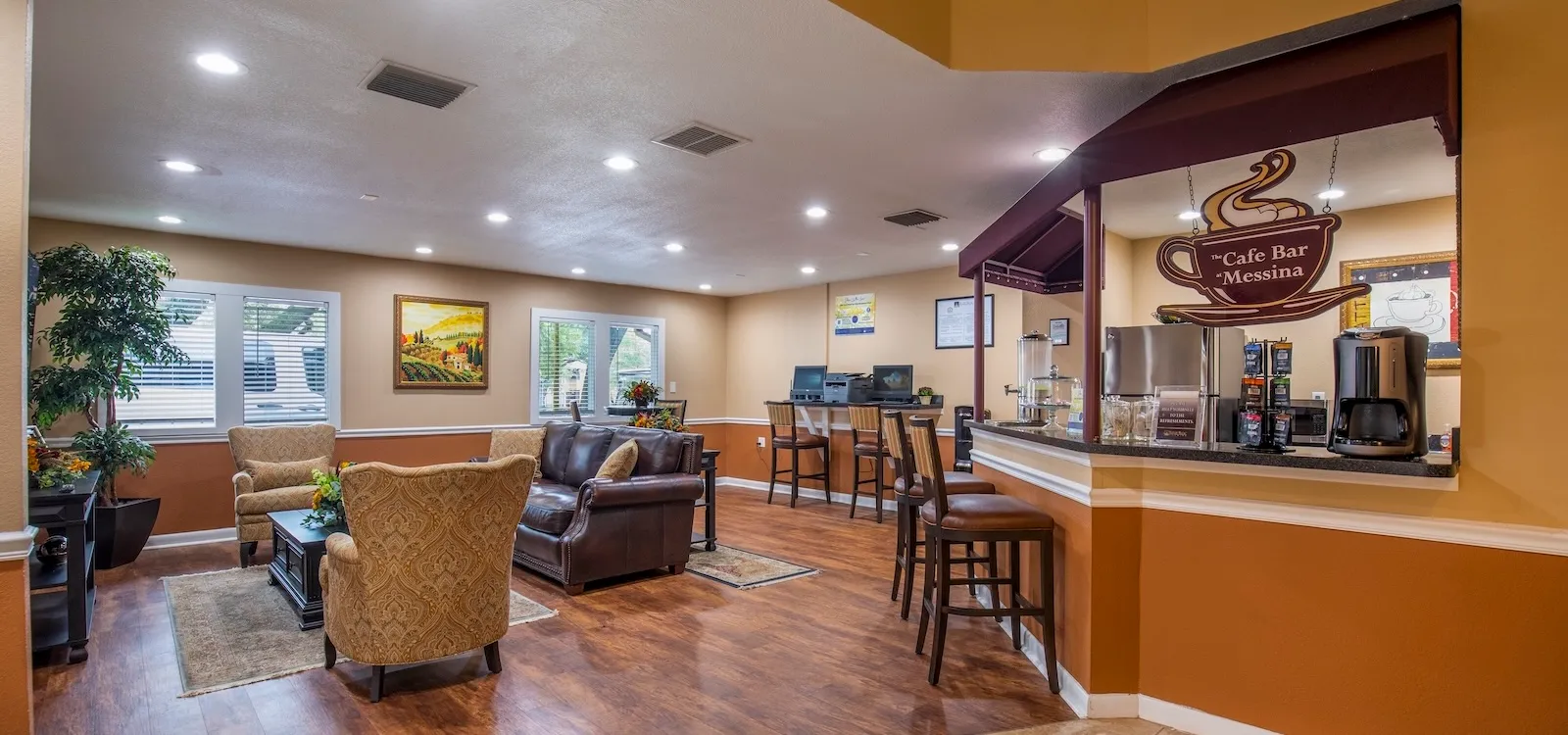 Residents club room with coffee and tea service area and business center