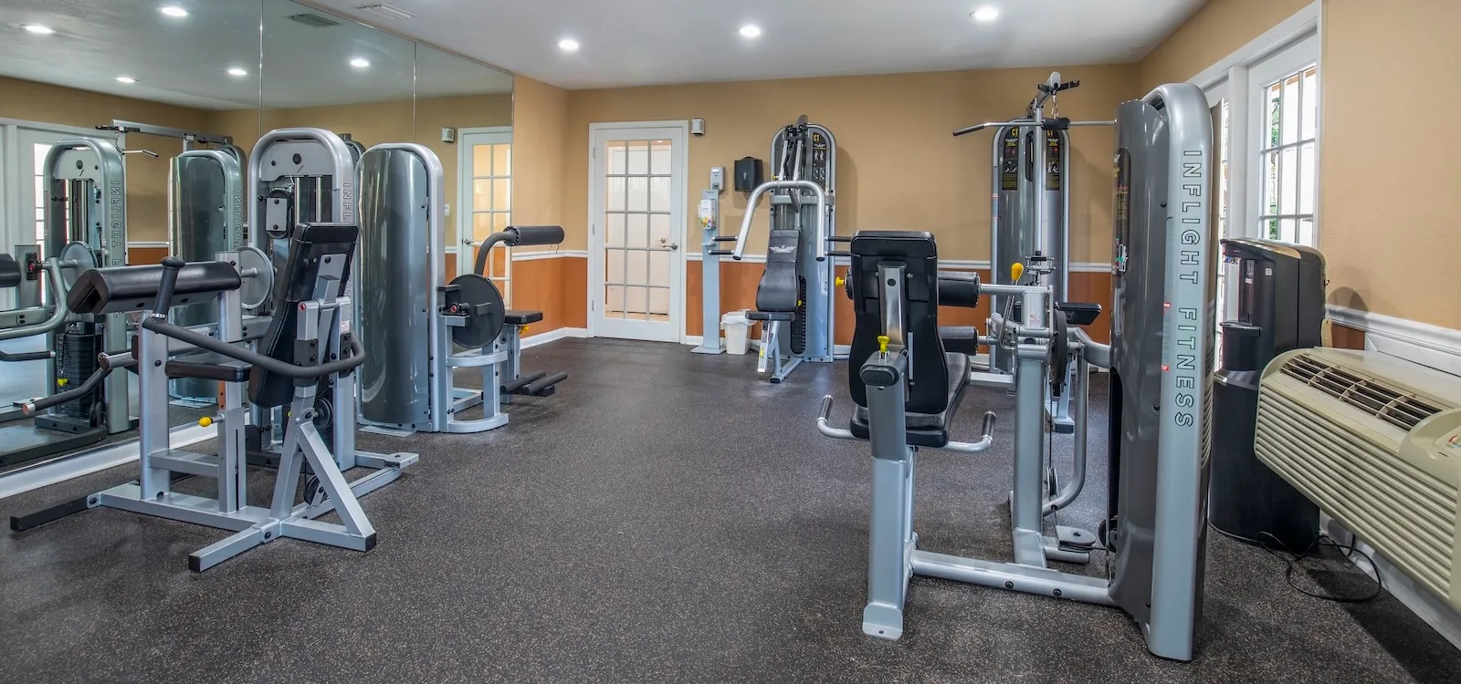 Residents club house 24-hour fitness center with weight machines